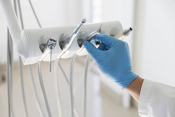 Professional Tooth Extraction technician working in Gilmer, TX
